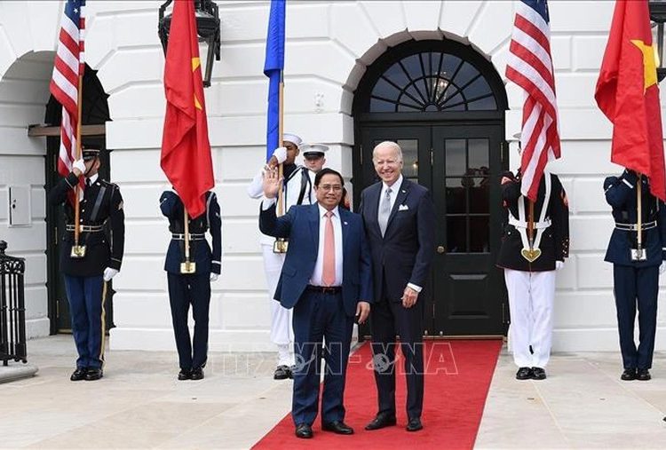 Thủ tướng Phạm Minh Chính và Tổng thống Joe Biden (Ảnh: TTXVN).